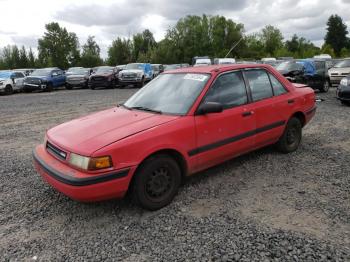  Salvage Mazda Protege