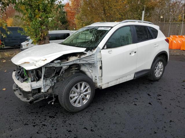  Salvage Mazda Cx