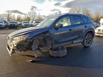  Salvage Mazda Cx